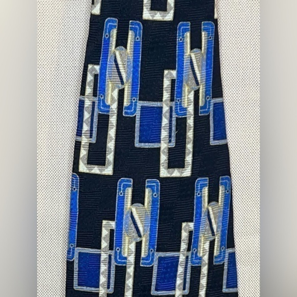 X’Andrini men’s silk contemporary blue and tan geometric tie